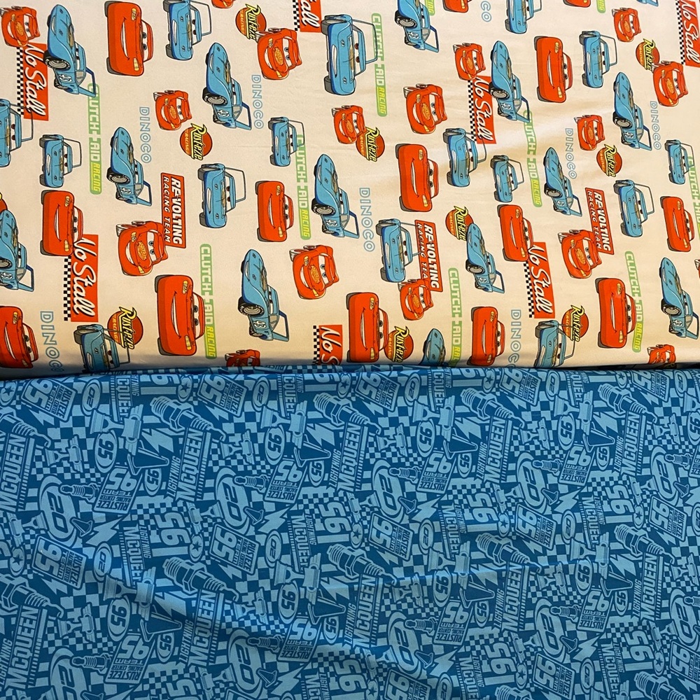 2 toddler size fitted bed sheets- Disney Cars